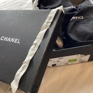 Suede orange Chanel sneakers